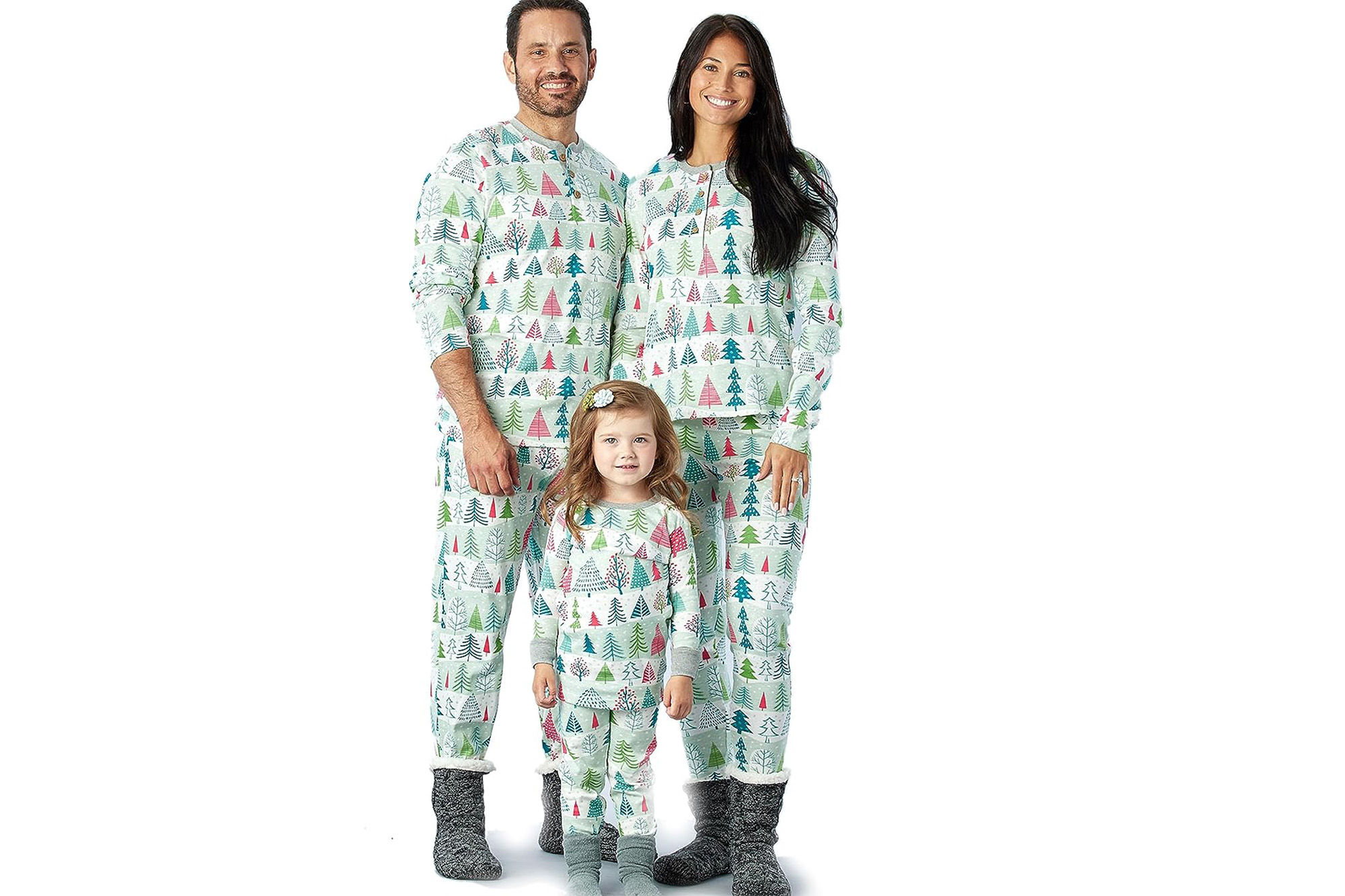 A family in tree-printed pjs